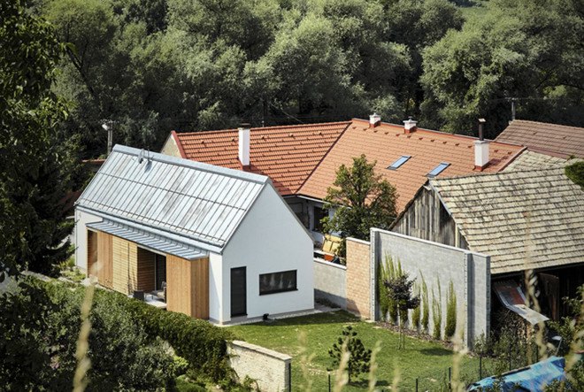 Wooden Brick House, Slovakia, Jaro Krobot, green architecture, reclaimed materials, traditional architecture, pitched roof, natural light, Swiss structural system, STEKO system