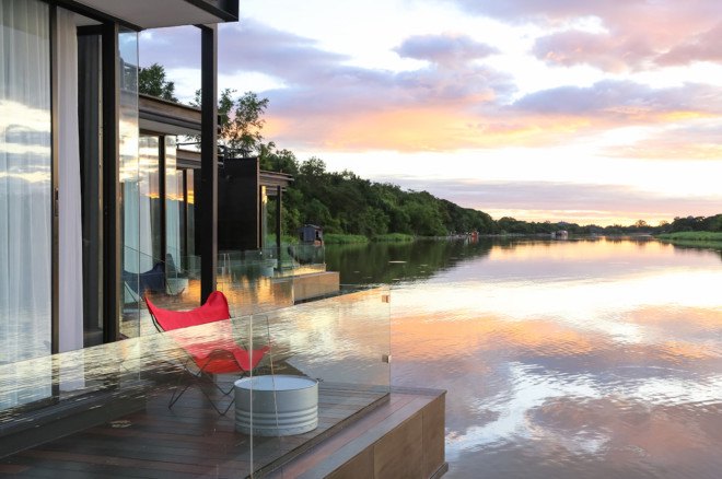 floating architecture, romantic getaways, valentine's day, floating airbnb, floating vacation spots, houseboats, airbnb houseboats, houseboats for rent, houseboat architecture, floating chapel, The Floatwing, The Saunalautta, Floating Thames AirBnb, Project X2 River Kwai Resort, The Four Seasons’ Landaa Giraavaru, The WaterNest 100