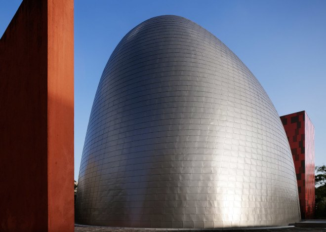k/o design studio, japanese architecture, tokyo architecture, Kanagawa, facade, facade design, metal sheet facade, japan, school, curved building, curved interior, curved walls, cladding