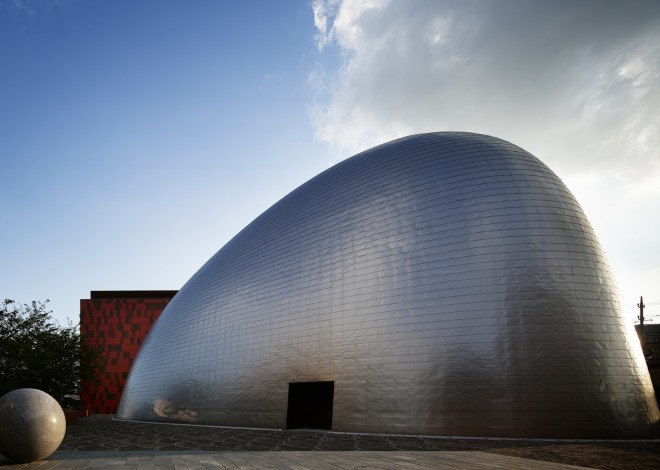 k/o design studio, japanese architecture, tokyo architecture, Kanagawa, facade, facade design, metal sheet facade, japan, school, curved building, curved interior, curved walls, cladding