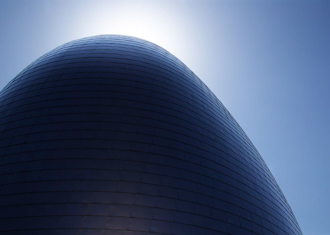 k/o design studio, japanese architecture, tokyo architecture, Kanagawa, facade, facade design, metal sheet facade, japan, school, curved building, curved interior, curved walls, cladding
