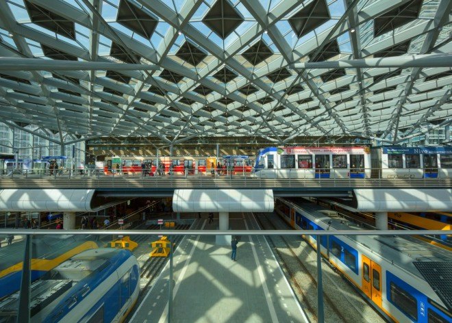 Benthem Crouwel Architects, Den Haag Centraal station, Hague railway roof, diamond shaped roof, glass roof, architecture, amsterdam train station, train station design, architecture, green design, sustainable design,
