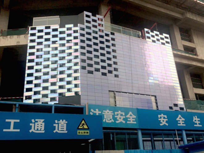 MVRDV, Chongwenmen M-Cube, Beijing, Beijing architecture, shopping mall, pearlescent, pearlescent facade, Jacob van Rijs, bespoke tiles, pearlescent tiles, iridescent facade, atrium