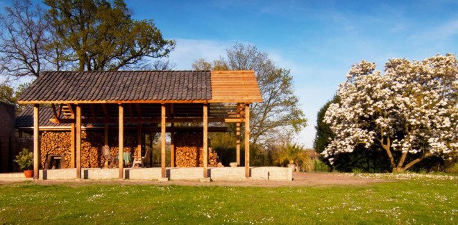 DeBossa, Zegenwerp Mansion timber pavilion, split log timber pavilion, split-level shelter, Dutch Mansion, The Netherlands, Eindhoven, Brabants Landschap, firewood pavilion made with fallen trees, gable roof pavilion