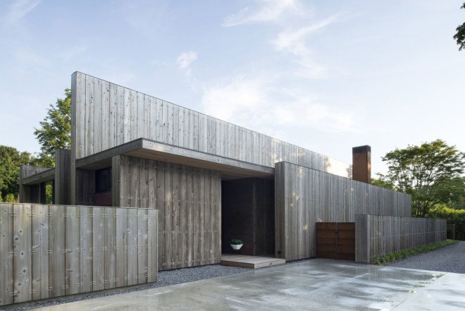 Elisabeth II concrete house, Bates Masi Architects, concrete house in Amagansett, cedar-clad house, acoustic performance, noise reducing house, cedar board cladding, natural building materials, thermal insulation, green architecture in New York, timber cladding, green materials, noise pollution