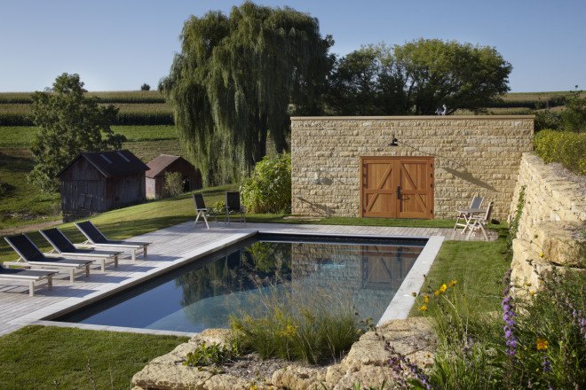 barn-inspired architecture, barn-inspired home, salvaged materials, recycled materials, solar powered home, Northworks, Thistle Hill Farm, Squak Mountain Stone, The Rug Company