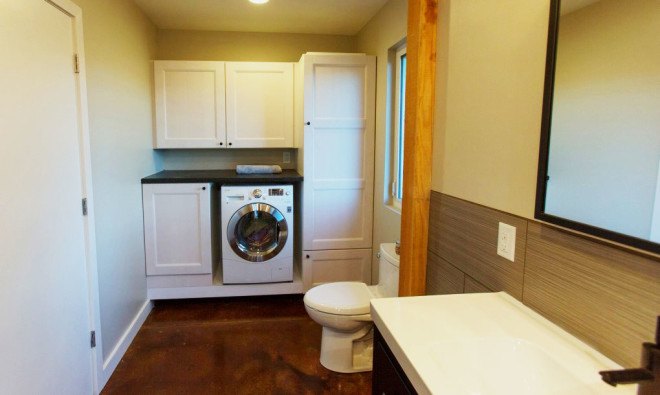 Acre Designs, net-zero house, prefab house, automated house, energy efficient house, solar panels, architecture, design, laundry room, energy efficient appliances, Griffin House