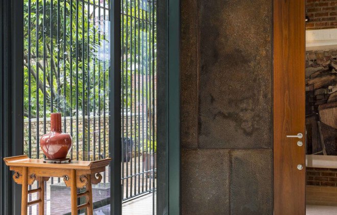 Clay Roof House, DRTAN LM Architect, perforated brick, perforated facade, reused materials, terracotta, clay roof tiles, green renovation, green architecture, natural ventilation, shading system, natural building materials