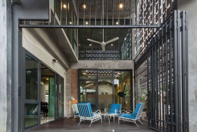 Clay Roof House, DRTAN LM Architect, perforated brick, perforated facade, reused materials, terracotta, clay roof tiles, green renovation, green architecture, natural ventilation, shading system, natural building materials