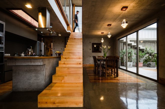 Jardines del Sur House, DX Arquitectos, Chile, native wood, regionally sourced building materials, rustic house, courtyard, swimming pool, green architecture