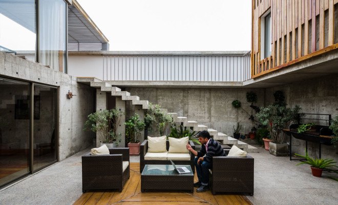Jardines del Sur House, DX Arquitectos, Chile, native wood, regionally sourced building materials, rustic house, courtyard, swimming pool, green architecture