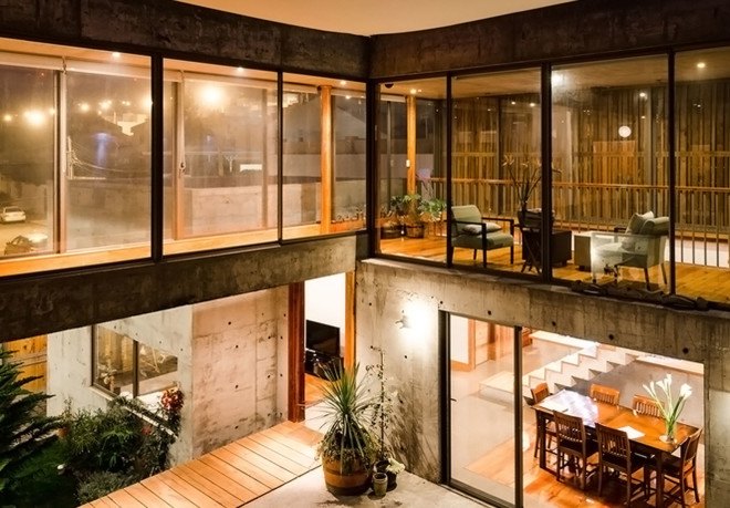 Jardines del Sur House, DX Arquitectos, Chile, native wood, regionally sourced building materials, rustic house, courtyard, swimming pool, green architecture