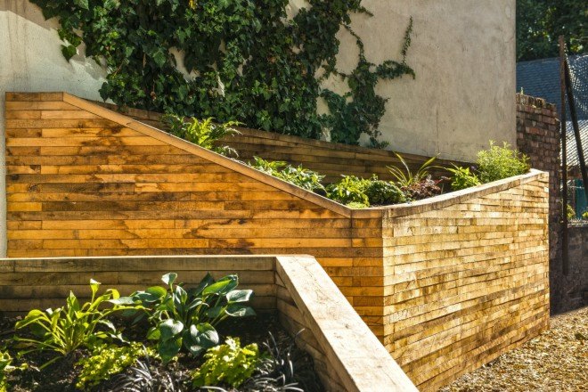 Wildstone designers, Lambeth Palace Road, pocket gardens, urban design, hybrid advertising space and community garden, Anti-social behaviour london, london community gardens, urban gardens, landscape design, wooden crates, sustainably sourced oak timber