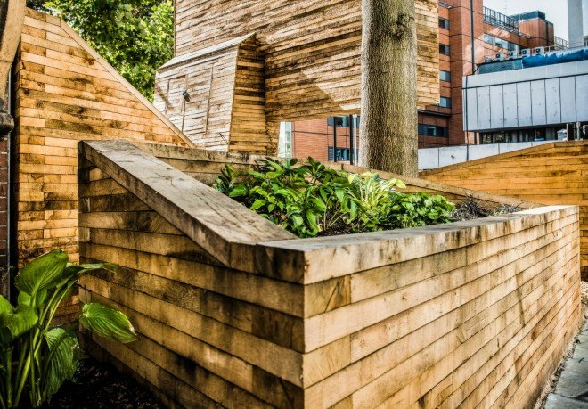 Wildstone designers, Lambeth Palace Road, pocket gardens, urban design, hybrid advertising space and community garden, Anti-social behaviour london, london community gardens, urban gardens, landscape design, wooden crates, sustainably sourced oak timber