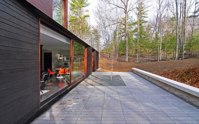 Pleated House by Johnsen Schemaling Architects, Wisconsin green roofed architecture, Door County architecture, charred timber architecture