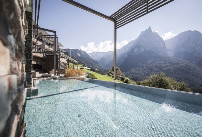Valentinerhof hotel, noa* network of architecture, green hotel natural materials, traditional building techniques, infinity pool, swimming pool, spa center, wellness center, green architecture