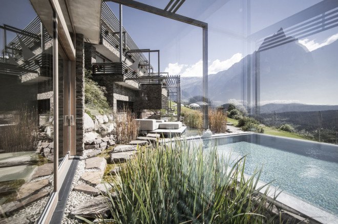 Valentinerhof hotel, noa* network of architecture, green hotel natural materials, traditional building techniques, infinity pool, swimming pool, spa center, wellness center, green architecture