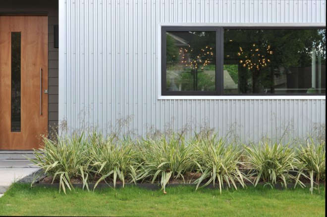 Emory House, small spaces, Texas, studioMET, repurposed wood, Habitat for Humanity, affordable house, green architecture, natural light, green patio, wooden floors, utility costs