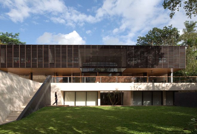 Gallop House, Singapore, timber-clad house, Formwerks Architects, timber screens, wooden louvers, locally sourced wood, treehouse, swimming pool, green architecture