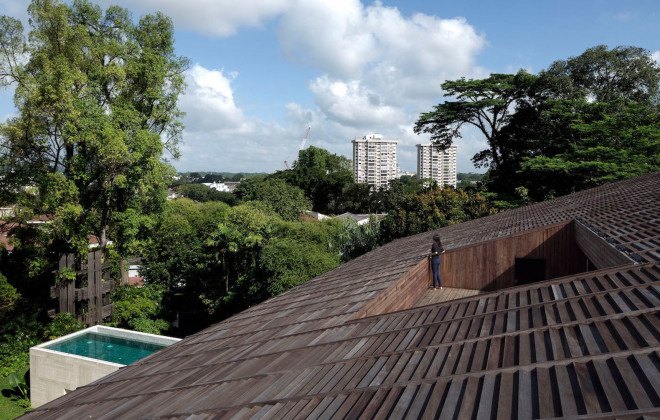 Gallop House, Singapore, timber-clad house, Formwerks Architects, timber screens, wooden louvers, locally sourced wood, treehouse, swimming pool, green architecture