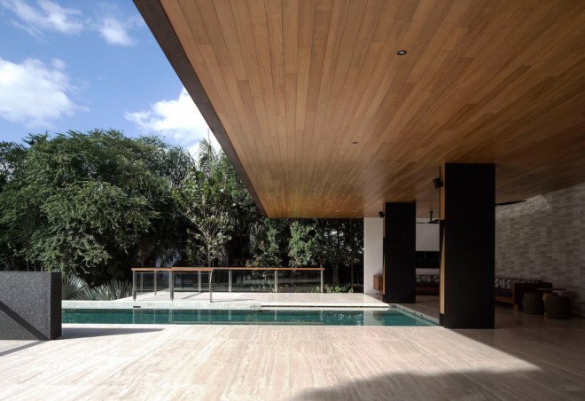 Gallop House, Singapore, timber-clad house, Formwerks Architects, timber screens, wooden louvers, locally sourced wood, treehouse, swimming pool, green architecture