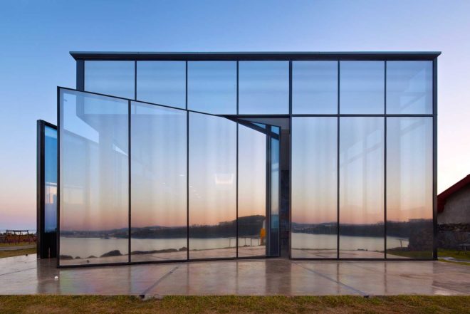 platform_a, glazed cafe, platform_monsant, Aeweol, South Korea, crushed stone, unfinished concrete wall, reflective glass skin,