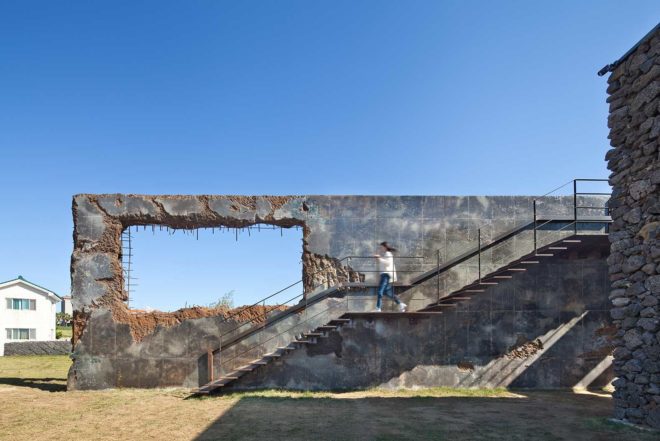 platform_a, glazed cafe, platform_monsant, Aeweol, South Korea, crushed stone, unfinished concrete wall, reflective glass skin,