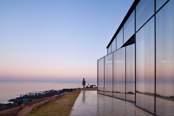 platform_a, glazed cafe, platform_monsant, Aeweol, South Korea, crushed stone, unfinished concrete wall, reflective glass skin,