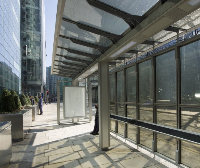 Canary Wharf Group solar project, solar bus shelter UK, solar bus shelter by Polysolar, solar bus shelter by Canary Wharf Group, transparent photovoltaics, transparent solar panels