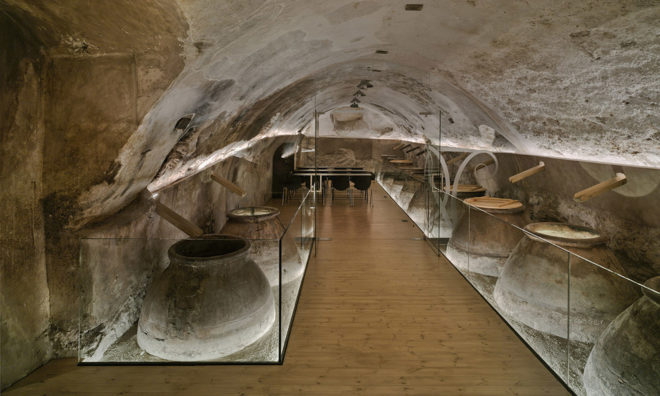 INMAT Arquitectura, wine cellar, green conversion, Spain, gallery space, wine cellar, glass walkways, glass ramp, green architecture, terracotta, landmark building