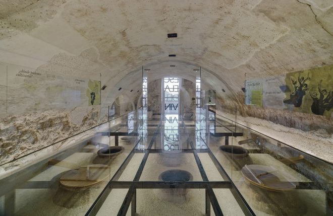 INMAT Arquitectura, wine cellar, green conversion, Spain, gallery space, wine cellar, glass walkways, glass ramp, green architecture, terracotta, landmark building