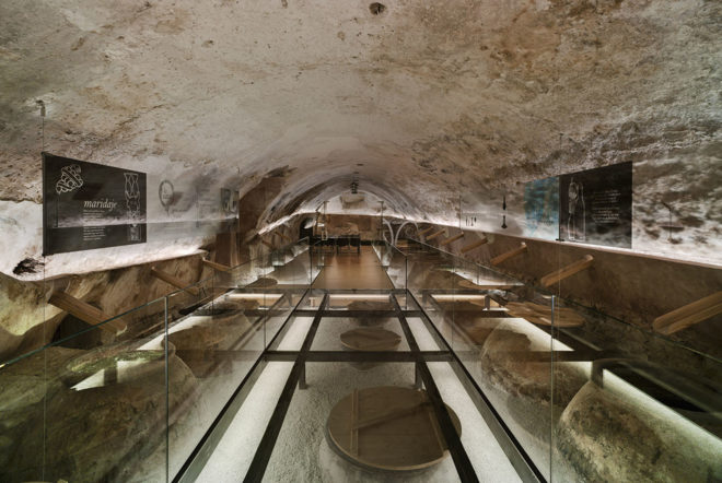 INMAT Arquitectura, wine cellar, green conversion, Spain, gallery space, wine cellar, glass walkways, glass ramp, green architecture, terracotta, landmark building