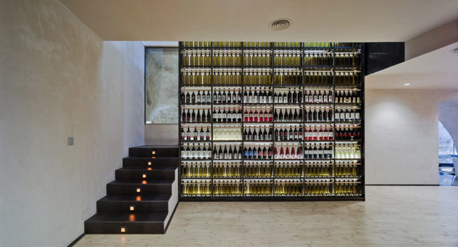INMAT Arquitectura, wine cellar, green conversion, Spain, gallery space, wine cellar, glass walkways, glass ramp, green architecture, terracotta, landmark building