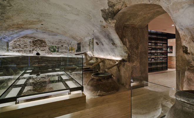 INMAT Arquitectura, wine cellar, green conversion, Spain, gallery space, wine cellar, glass walkways, glass ramp, green architecture, terracotta, landmark building