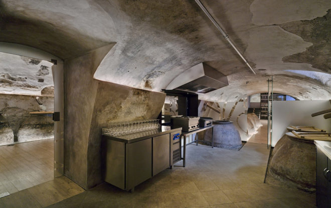 INMAT Arquitectura, wine cellar, green conversion, Spain, gallery space, wine cellar, glass walkways, glass ramp, green architecture, terracotta, landmark building