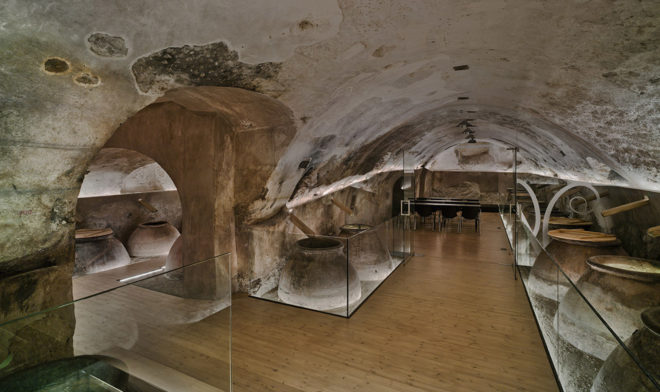 INMAT Arquitectura, wine cellar, green conversion, Spain, gallery space, wine cellar, glass walkways, glass ramp, green architecture, terracotta, landmark building