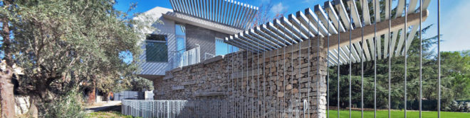 North Face by nodo17 group, Madrid passive solar architecture, recycled granite in house, passive solar architecture in Spain, naturally cooled homes