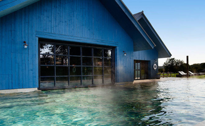 Michaelis Boyd, Soho House, Soho Farmhouse, England, countryside retreat, green retreat, London, private club, green architecture, infinity pool, communal spaces, mezzanine, sauna, kids playground, cabins
