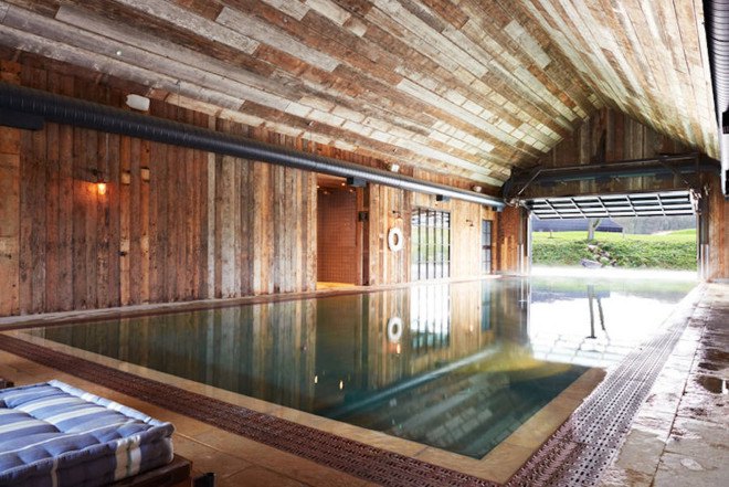 Michaelis Boyd, Soho House, Soho Farmhouse, England, countryside retreat, green retreat, London, private club, green architecture, infinity pool, communal spaces, mezzanine, sauna, kids playground, cabins