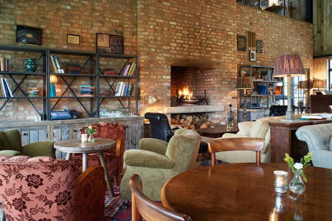 Michaelis Boyd, Soho House, Soho Farmhouse, England, countryside retreat, green retreat, London, private club, green architecture, infinity pool, communal spaces, mezzanine, sauna, kids playground, cabins