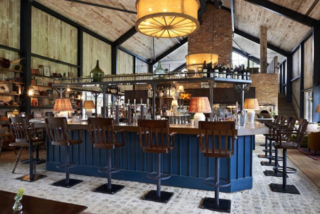 Michaelis Boyd, Soho House, Soho Farmhouse, England, countryside retreat, green retreat, London, private club, green architecture, infinity pool, communal spaces, mezzanine, sauna, kids playground, cabins