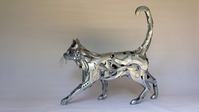 Hubcap creatures by Ptolemy Elrington, hubcap sculpture, recycled hubcaps, upcycled hubcaps. hubcap animal sculptures