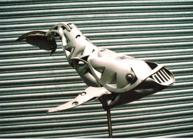 Hubcap creatures by Ptolemy Elrington, hubcap sculpture, recycled hubcaps, upcycled hubcaps. hubcap animal sculptures