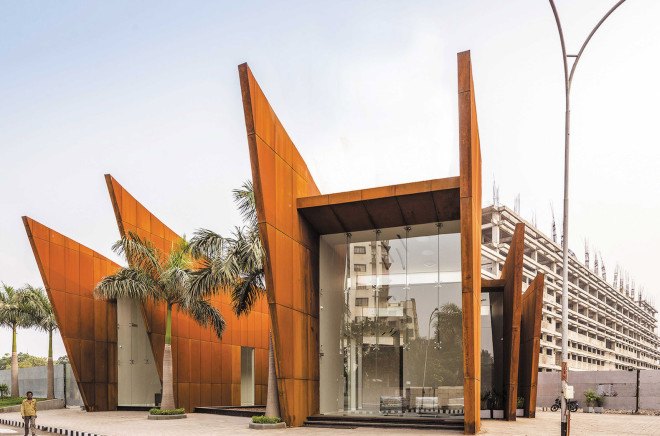 The Crescent by Sanjay Puri Architects, solar savvy architecture, curvaceous Corten Steel building, Corten Steel architecture, Corten steel office building, office design in India,