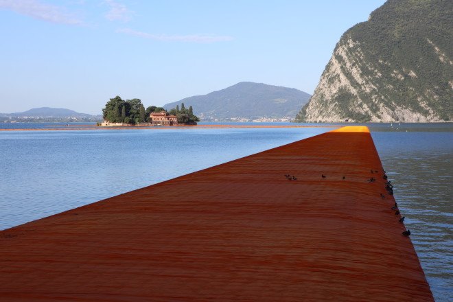 The Floating Piers by Christo, Floating Piers in Lake Iseo, Floating Piers in Italy, large scale art by Christo, temporary large scale art installation