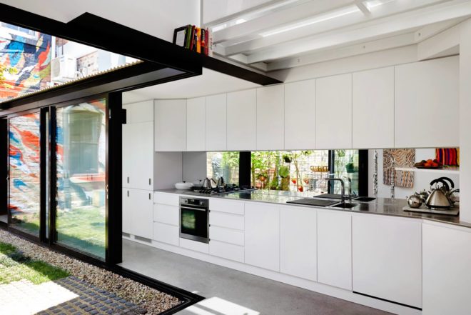 Austin Maynard Architects, green renovation, Alfred House, Australia, home extension, green courtyard, gable roof, white extension,