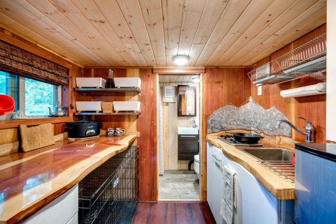 Basecamp, Backcountry Tiny Homes, Luke Orlando, Tina Orlando, tiny home, tiny homes, tiny house, tiny houses, wood, design, architecture, outdoors, deck, mountain climbing, tiny house deck, tiny home deck, tiny house design, tiny home design
