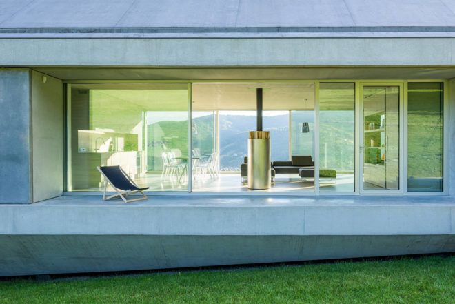 KWK Promes, concrete home, Poland, Robert Konieczny, Konieczny Ark, safe home, hllside home, lets rainwater flow,