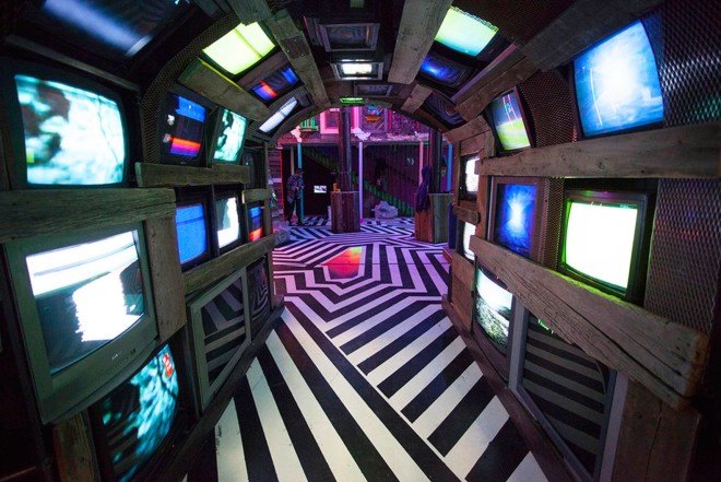 Meow Wolf, Game of Thrones creator, real life video game, The House of Eternal Return, immersive art, immersive space, glow in the dark, house, Santa Fe, recycled bowling alley