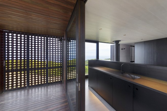 Jackson Clements Burrows architecture, australia, moonlight cabin, beach cabin, cliff cabin, cliff house, sustainable wood, louvred shutters, cross-ventilation